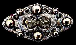 Brass Brooch, c. 1890, $28 Retail